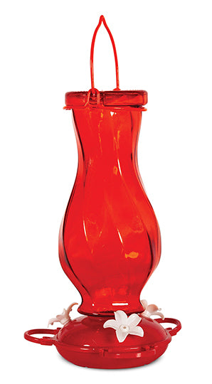 Red twisted glass. Red circular base with white flower feeding holes.