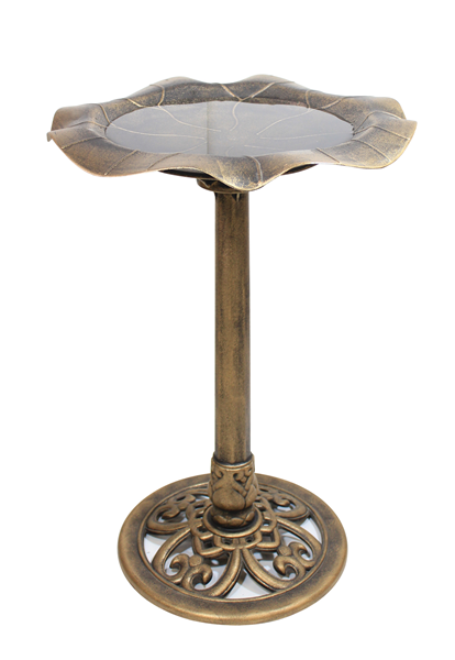 A gold tall birdbath.