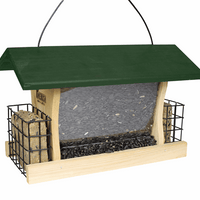 Wooden feeder with a green roof. The middle is filled with seeds while to two ends have suet cages with 2 suet cakes inside of them.