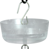 A bowl with leaf details carved into it, connected to 2 "S" shaped hooks for easy hanging.
