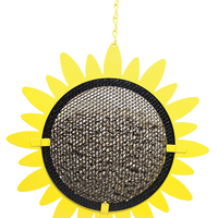 Shaped like a yellow sunflower. The center is a black mesh filled with seeds.