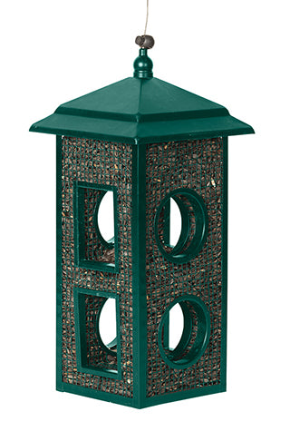 Green rectangle shaped feeder with a green roof. Circular and rectangular holes are in the feeder to make it easy for birds to fly through and eat the seeds at all angles.