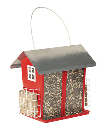 Shaped like a house. Grey roof, feeder, with white windows and cages on the sides. It is filled to the top with seeds, and there are suet cakes inside each of the suet cages.