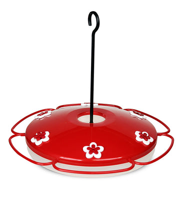 Red tray with white flower shaped feeding holes. Black hook in the center to assist with hanging.