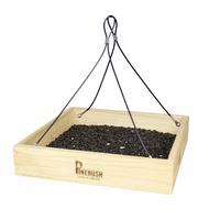 Wooden tray with seeds inside. 4 strings from each corner that meet in the middle at the top to hang the feeder.