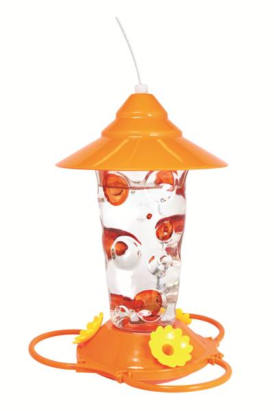 Cone shaped orange lid, clear glass for nectar with orange hand painted dots on it, orange circular base with yellow flower shaped feeding holes.